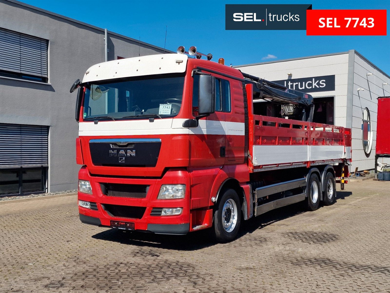 MAN TGX 26.400 6x2-2 BL / Intarder / HIAB /Lenkachse - Camião grua: foto 1 MAN TGX 26.400 6x2-2 BL / Intarder / HIAB /Lenkachse - Camião grua: foto 1