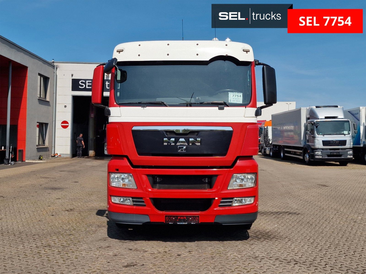 MAN TGX 26.400 6x2-2 BL/ Intarder / HIAB / Lenkachse - Camião grua: foto 2 MAN TGX 26.400 6x2-2 BL/ Intarder / HIAB / Lenkachse - Camião grua: foto 2