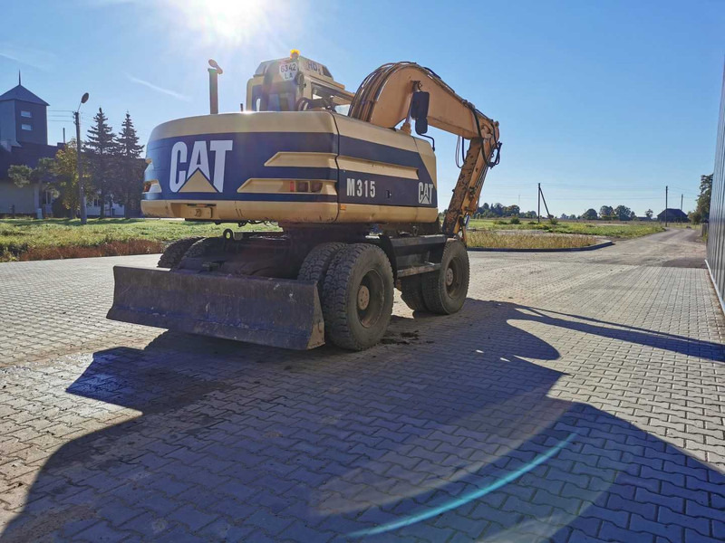 Caterpillar M315 wheel excavator - Escavadeira de rodas: foto 5 Caterpillar M315 wheel excavator - Escavadeira de rodas: foto 5