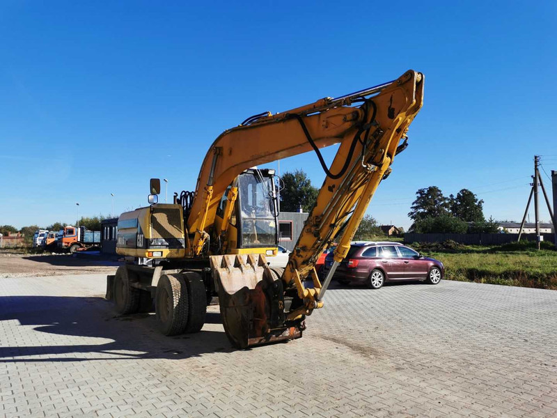 Caterpillar M315 wheel excavator - Escavadeira de rodas: foto 4 Caterpillar M315 wheel excavator - Escavadeira de rodas: foto 4