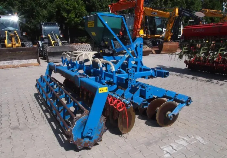 Agregat uprawowo-siewny Rabe Werk 2011 3m brona talerzowa z siewnikiem do poplonów - Semeadora combinada: foto 5 Agregat uprawowo-siewny Rabe Werk 2011 3m brona talerzowa z siewnikiem do poplonów - Semeadora combinada: foto 5