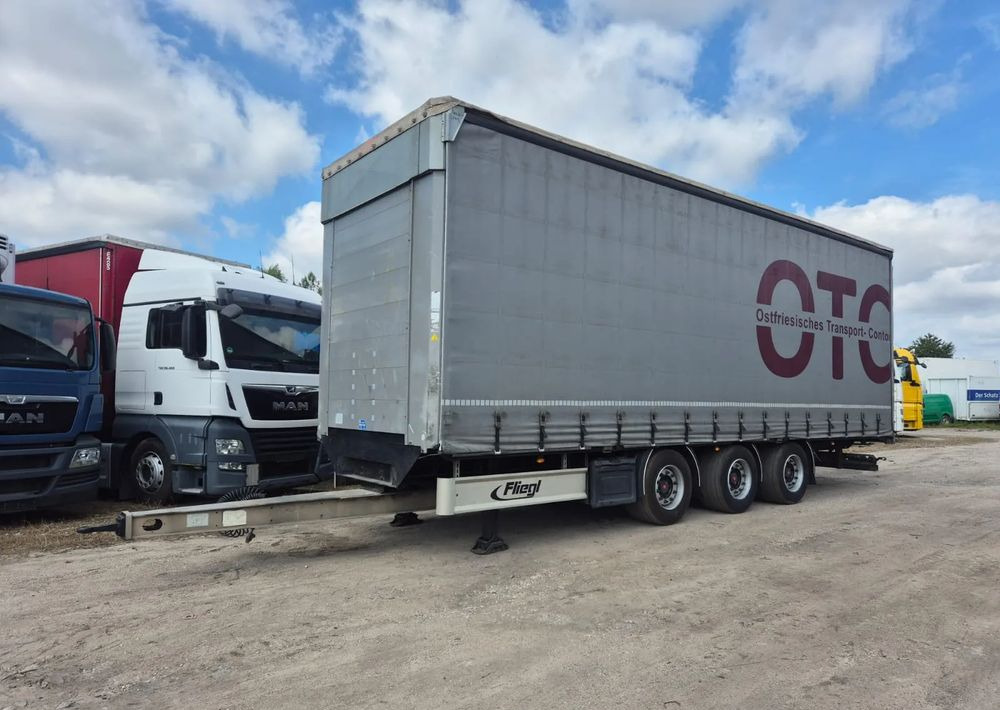 Fliegl Tandem 3 osie - Reboque de lona: foto 1 Fliegl Tandem 3 osie - Reboque de lona: foto 1