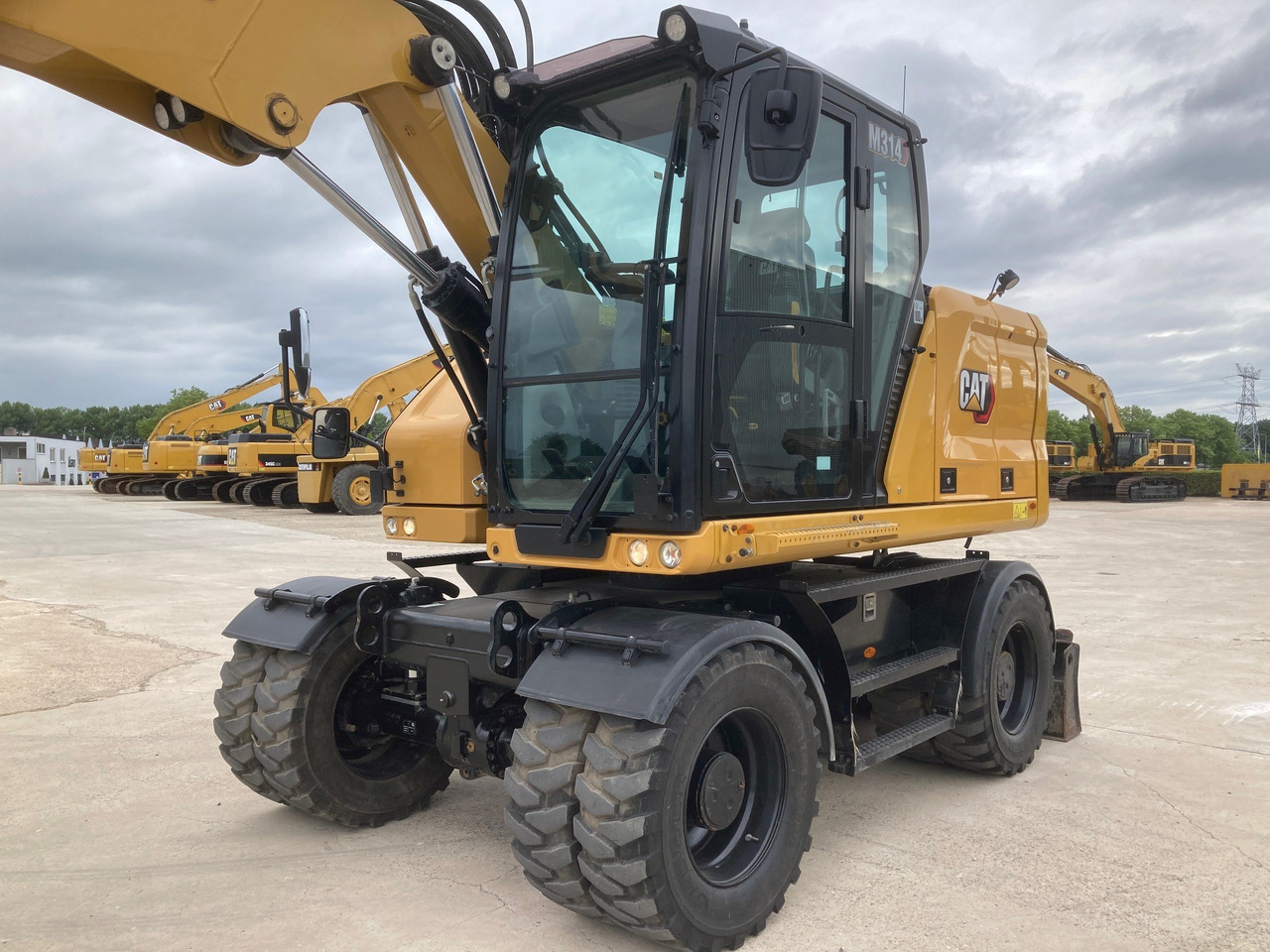 CATERPILLAR M314 - Escavadeira de rodas: foto 2 CATERPILLAR M314 - Escavadeira de rodas: foto 2