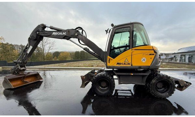 Mecalac 714 MW - Escavadeira de rodas: foto 1 Mecalac 714 MW - Escavadeira de rodas: foto 1