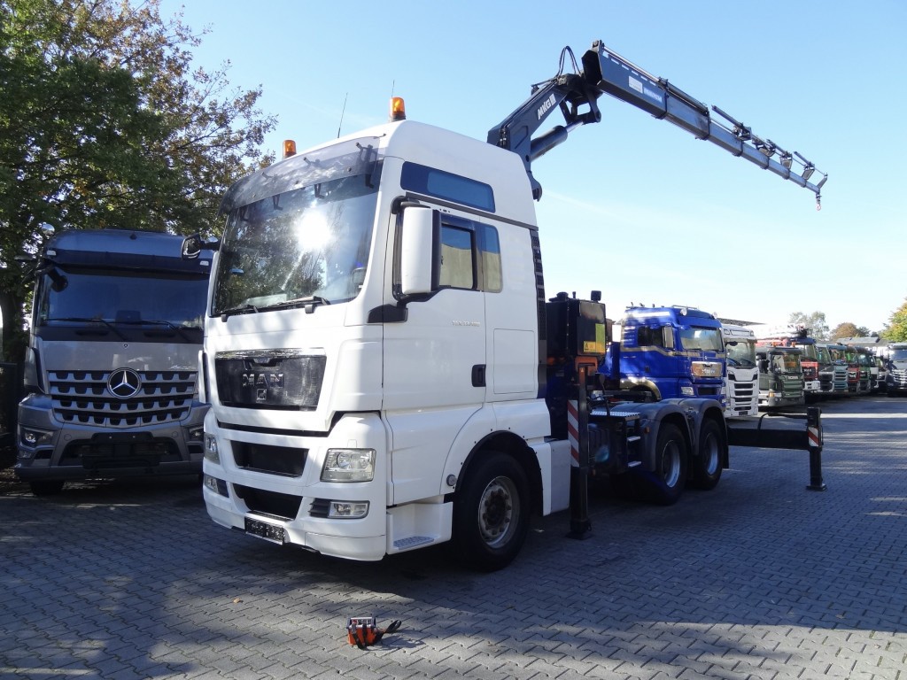 MAN TGX 33.480 6X4 Kran MKG 381 bis 20 Meter - Camião grua, Tractor: foto 1 MAN TGX 33.480 6X4 Kran MKG 381 bis 20 Meter - Camião grua, Tractor: foto 1