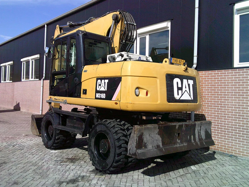 Caterpillar M316D - Escavadeira de rodas: foto 2 Caterpillar M316D - Escavadeira de rodas: foto 2