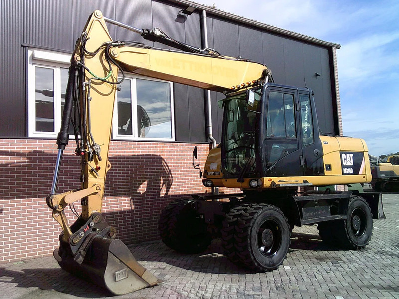 Caterpillar M316D - Escavadeira de rodas: foto 1 Caterpillar M316D - Escavadeira de rodas: foto 1