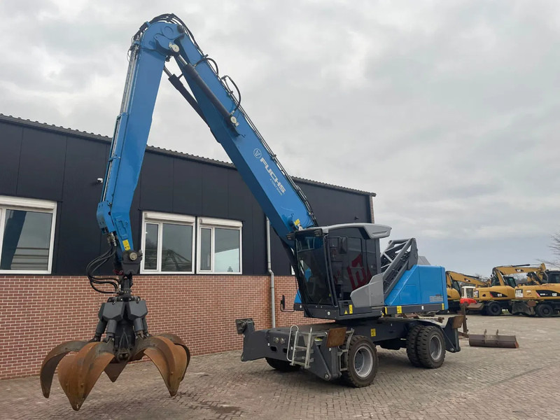 Fuchs MHL335 - Manipulador de material: foto 1 Fuchs MHL335 - Manipulador de material: foto 1