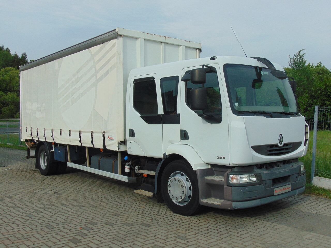 RENAULT Midlum 240DXi - Camião de lona: foto 2 RENAULT Midlum 240DXi - Camião de lona: foto 2
