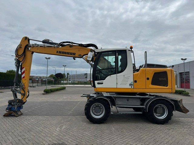 Liebherr A914 Rototilt - Escavadeira de rodas: foto 1 Liebherr A914 Rototilt - Escavadeira de rodas: foto 1