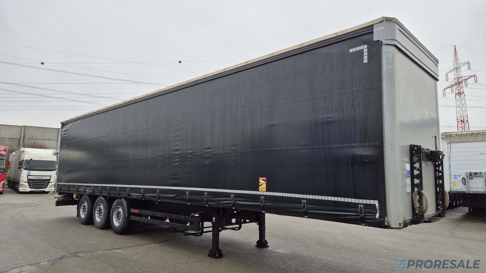 KÖGEL SN 24 CARGO - nové brzdy - Semi-reboque de lona: foto 1 KÖGEL SN 24 CARGO - nové brzdy - Semi-reboque de lona: foto 1