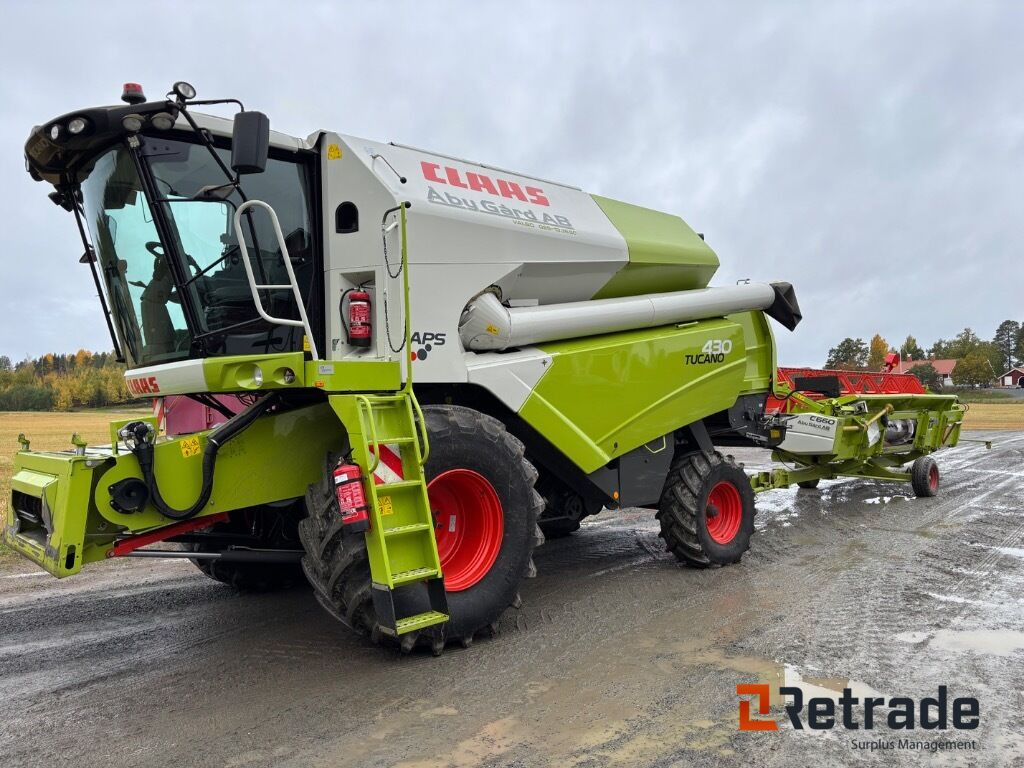 Skördetröska Claas Tucano 430 C 660 - Máquina agrícola: foto 1 Skördetröska Claas Tucano 430 C 660 - Máquina agrícola: foto 1