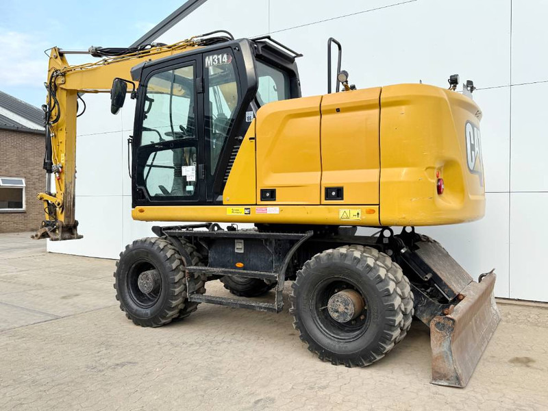 Cat M314 next gen - Triple Boom / Automatic Greasing - Escavadeira de rodas: foto 3 Cat M314 next gen - Triple Boom / Automatic Greasing - Escavadeira de rodas: foto 3