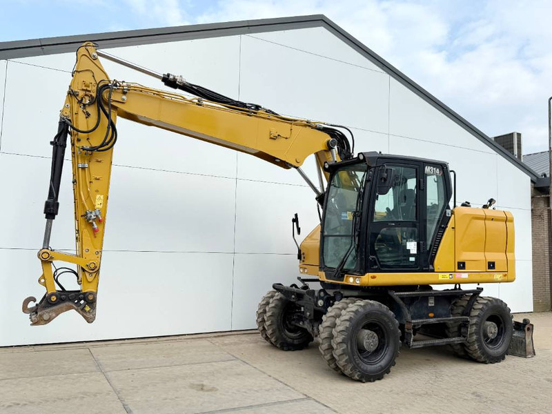 Cat M314 next gen - Triple Boom / Automatic Greasing - Escavadeira de rodas: foto 2 Cat M314 next gen - Triple Boom / Automatic Greasing - Escavadeira de rodas: foto 2