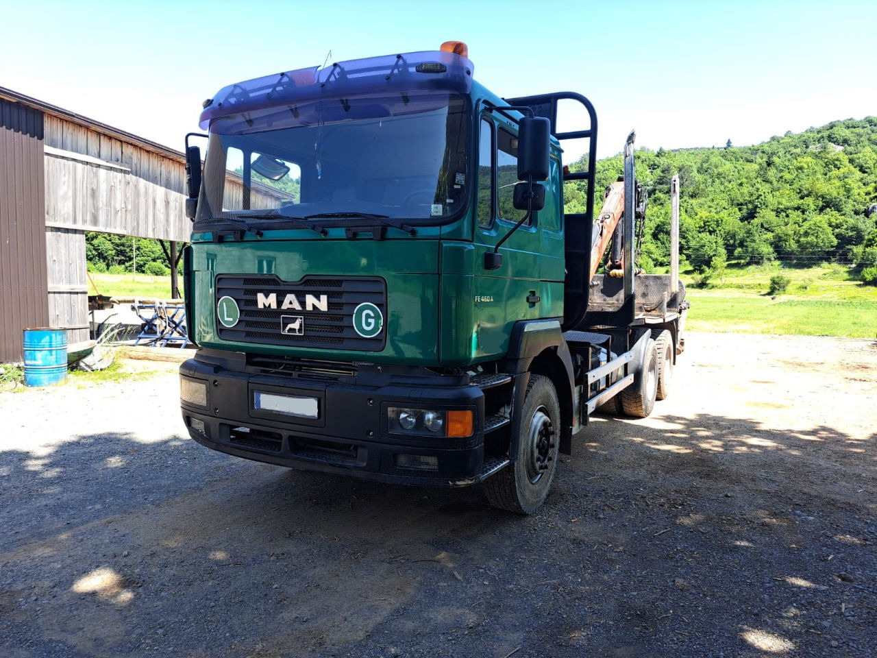 MAN 33.464 6x4 forest truck - Complete Spring - Epsilon E128 + scissors - Camião de transporte de madeira: foto 1 MAN 33.464 6x4 forest truck - Complete Spring - Epsilon E128 + scissors - Camião de transporte de madeira: foto 1