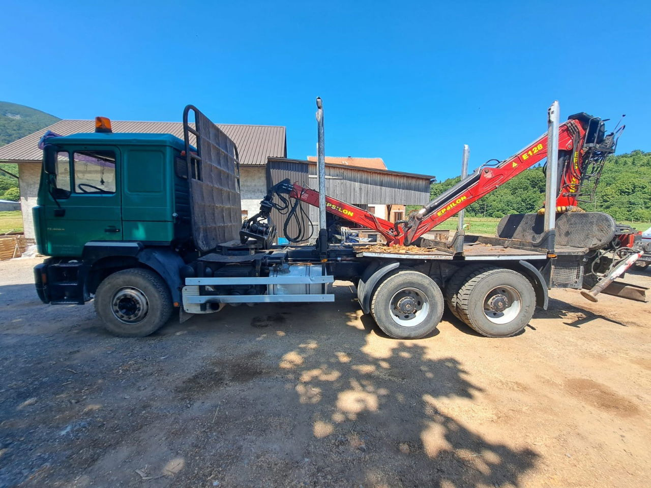 MAN 33.464 6x4 forest truck - Complete Spring - Epsilon E128 + scissors - Camião de transporte de madeira: foto 3 MAN 33.464 6x4 forest truck - Complete Spring - Epsilon E128 + scissors - Camião de transporte de madeira: foto 3