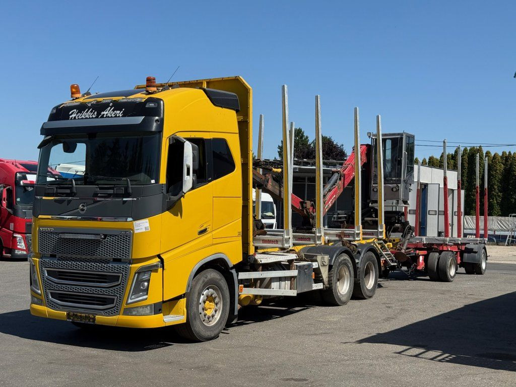 Volvo FH 16 750 6x4 + Fliegl - Camião de transporte de madeira, Camião grua: foto 1 Volvo FH 16 750 6x4 + Fliegl - Camião de transporte de madeira, Camião grua: foto 1