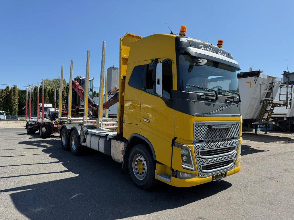 Volvo FH 16 750 6x4 + Fliegl - Camião de transporte de madeira, Camião grua: foto 2 Volvo FH 16 750 6x4 + Fliegl - Camião de transporte de madeira, Camião grua: foto 2