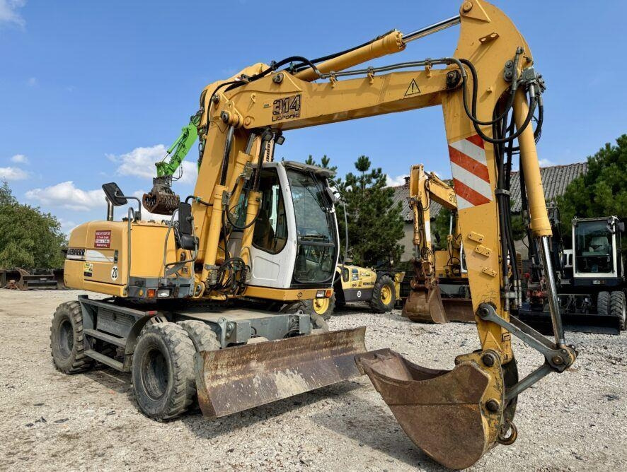 Liebherr A314 - Escavadeira de rodas: foto 5 Liebherr A314 - Escavadeira de rodas: foto 5