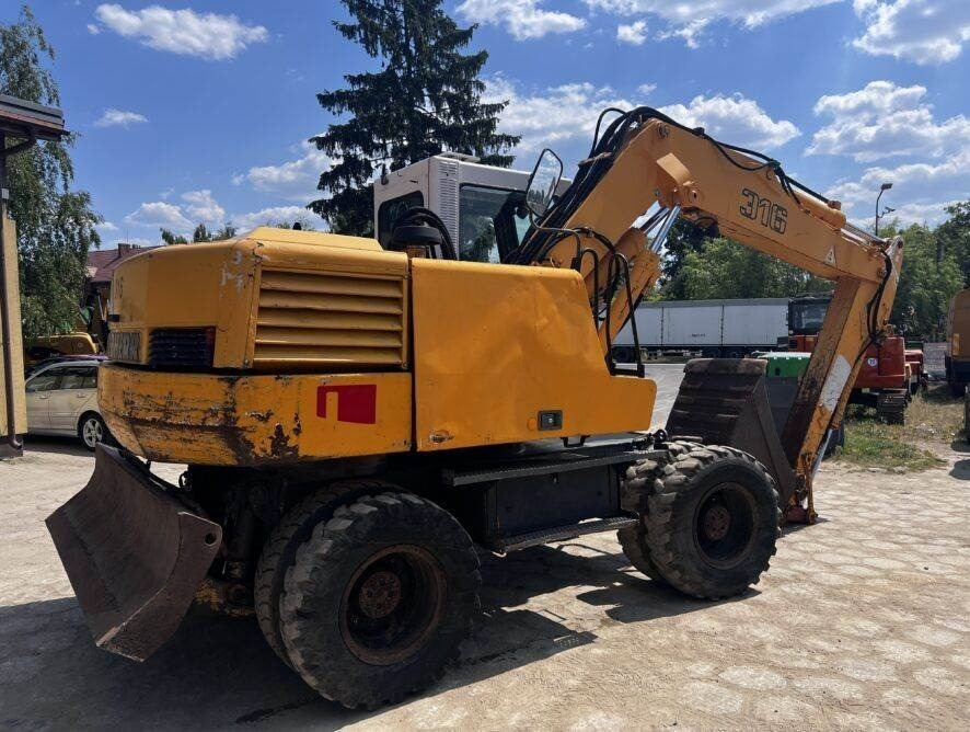 Liebherr A316 - Escavadeira de rodas: foto 5 Liebherr A316 - Escavadeira de rodas: foto 5