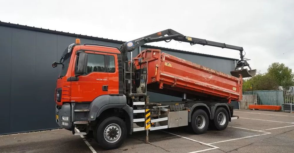 MAN TGS 28.400 / 6x6 / WYWROTKA 2-STRONNA Z HDS HMF 1643 Z2/ EURO 5 - Camião basculante: foto 1 MAN TGS 28.400 / 6x6 / WYWROTKA 2-STRONNA Z HDS HMF 1643 Z2/ EURO 5 - Camião basculante: foto 1