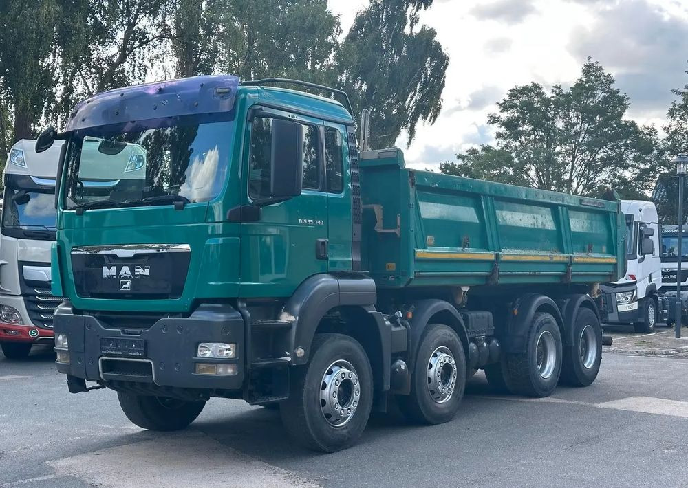 MAN TGS 35.440 8x4 Meiller Trójstronna wywrotka Bordmatik | Retarder | Euro 5 - Camião basculante: foto 1 MAN TGS 35.440 8x4 Meiller Trójstronna wywrotka Bordmatik | Retarder | Euro 5 - Camião basculante: foto 1