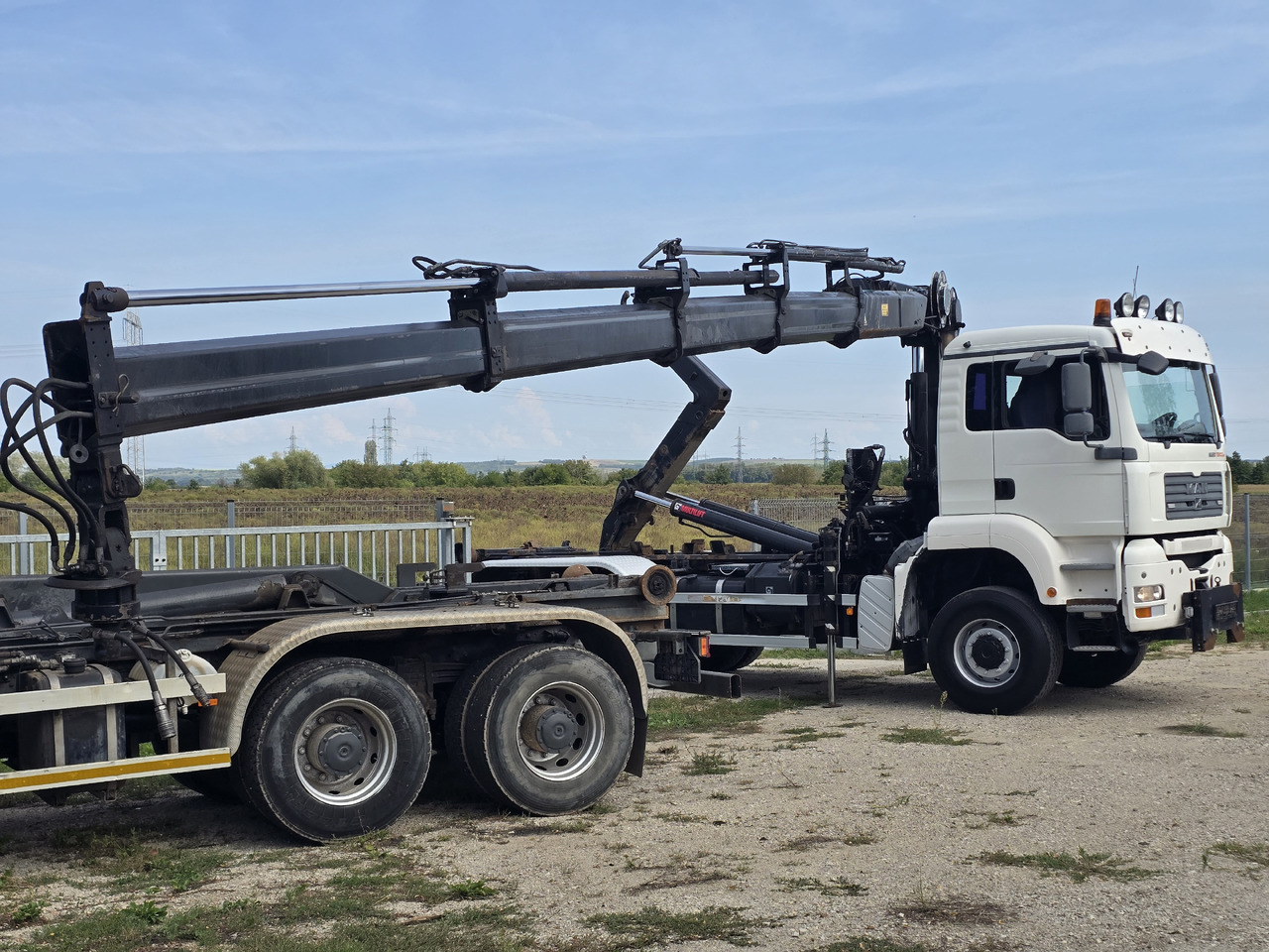 MAN TGA 26.440 6X6 / HOOK SYSTEM / HIAB 166D REMOTE SPECIAL PRICE ONLY THIS YEAR - Camião polibenne, Camião grua: foto 4 MAN TGA 26.440 6X6 / HOOK SYSTEM / HIAB 166D REMOTE SPECIAL PRICE ONLY THIS YEAR - Camião polibenne, Camião grua: foto 4