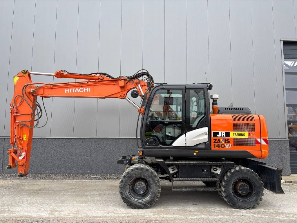 Hitachi ZX 140 W-5B - Escavadeira de rodas: foto 1 Hitachi ZX 140 W-5B - Escavadeira de rodas: foto 1