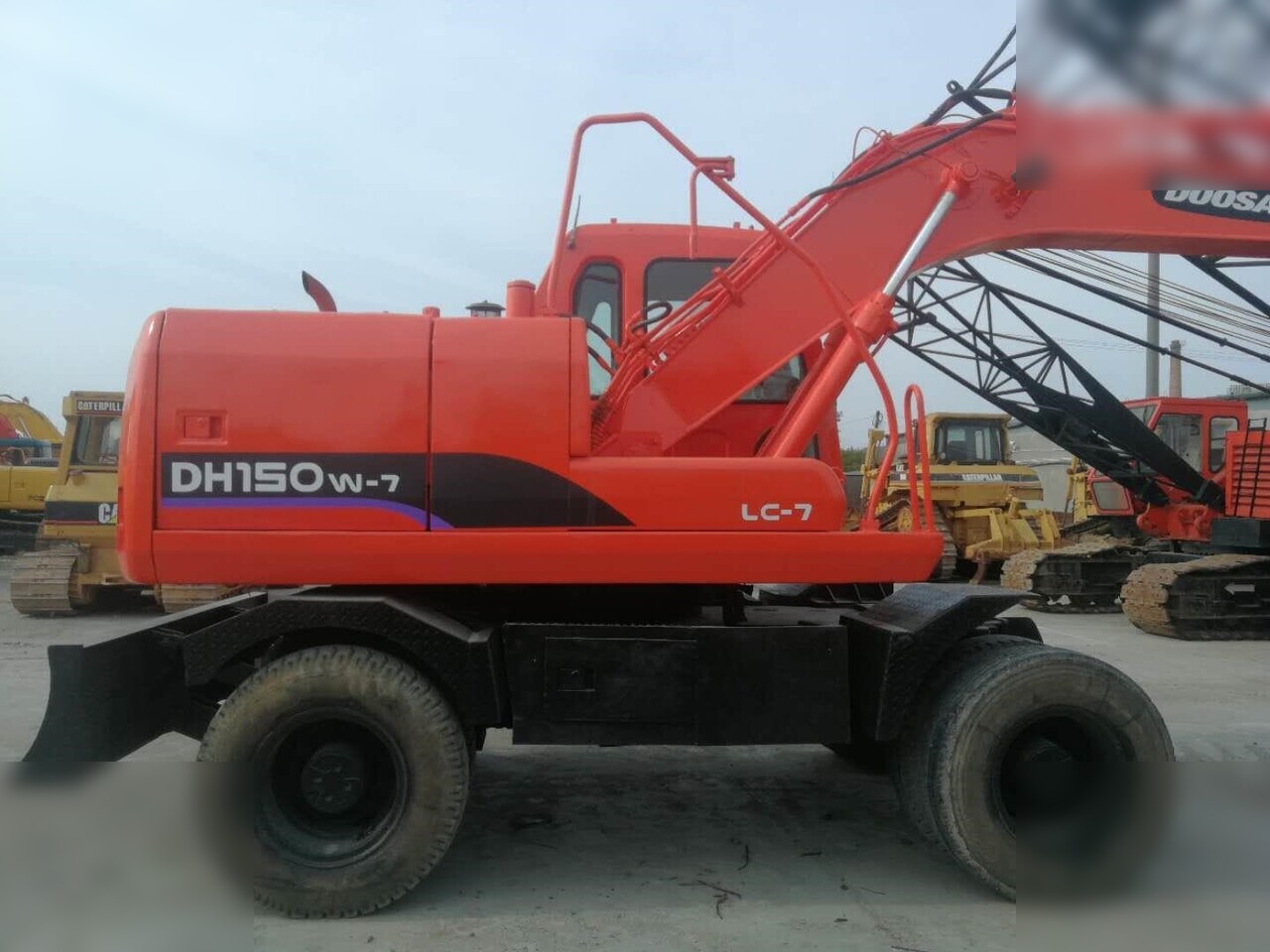 DOOSAN DH150W-7 - Escavadeira de rodas: foto 5 DOOSAN DH150W-7 - Escavadeira de rodas: foto 5