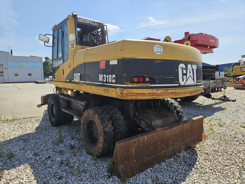 CATERPILLAR M318C - Escavadeira de rodas: foto 4 CATERPILLAR M318C - Escavadeira de rodas: foto 4