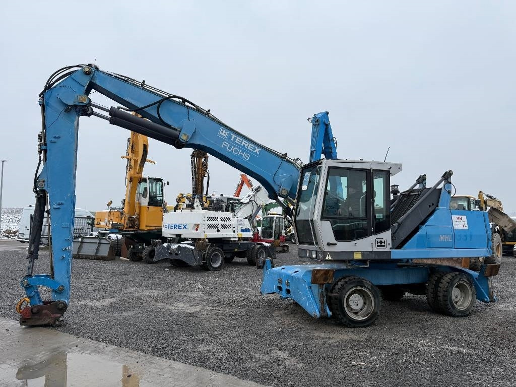Fuchs MHL 331 - Manipulador de material: foto 1 Fuchs MHL 331 - Manipulador de material: foto 1