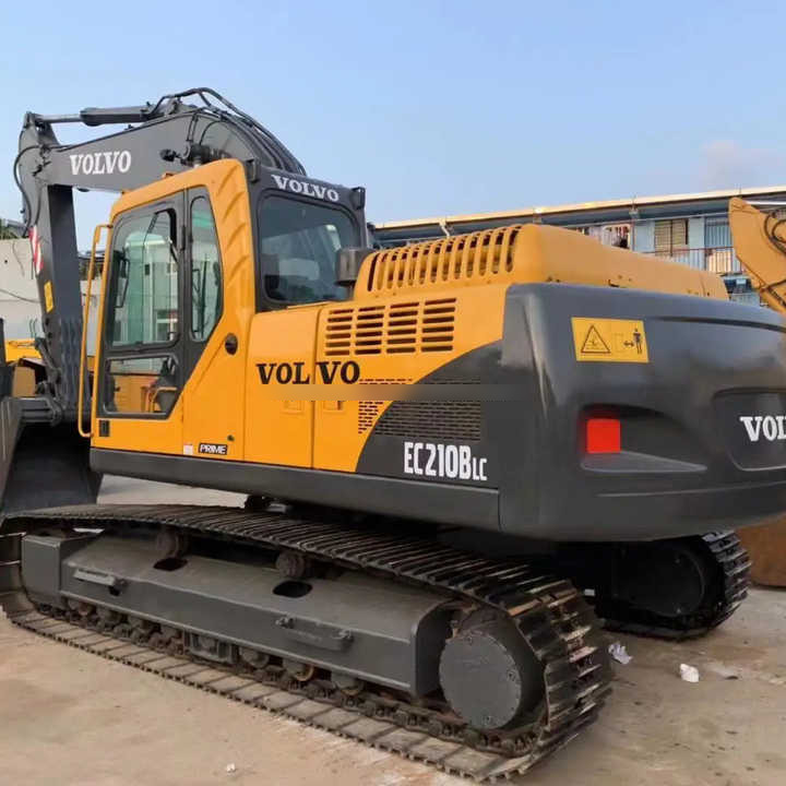 Used Original Volvo Excavator EC210B machinery in stock for sale with high quality and good price - Escavadora de rastos: foto 1 Used Original Volvo Excavator EC210B machinery in stock for sale with high quality and good price - Escavadora de rastos: foto 1