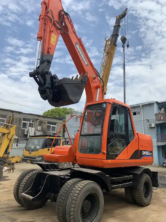 Wheel digging excavator Used DOOSAN150W DH150W DH150W-7 / second-hand KOREA engine DOOSAN DH 150 150W-7 DOOSAN150 - Escavadora de rastos: foto 3 Wheel digging excavator Used DOOSAN150W DH150W DH150W-7 / second-hand KOREA engine DOOSAN DH 150 150W-7 DOOSAN150 - Escavadora de rastos: foto 3
