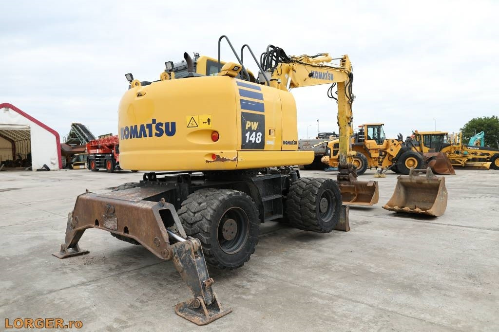 Komatsu PW 148-10 - Escavadeira de rodas: foto 4 Komatsu PW 148-10 - Escavadeira de rodas: foto 4