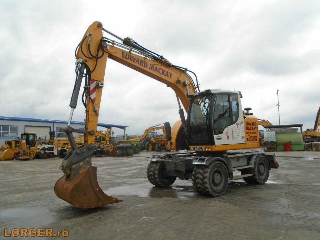Liebherr A 914 - Escavadeira de rodas: foto 1 Liebherr A 914 - Escavadeira de rodas: foto 1