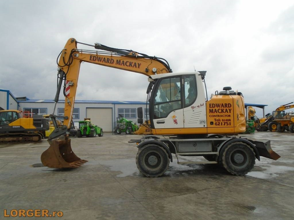 Liebherr A 914 - Escavadeira de rodas: foto 2 Liebherr A 914 - Escavadeira de rodas: foto 2