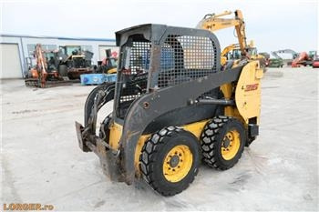 New Holland L 215 - Mini pá carregadora: foto 1 New Holland L 215 - Mini pá carregadora: foto 1