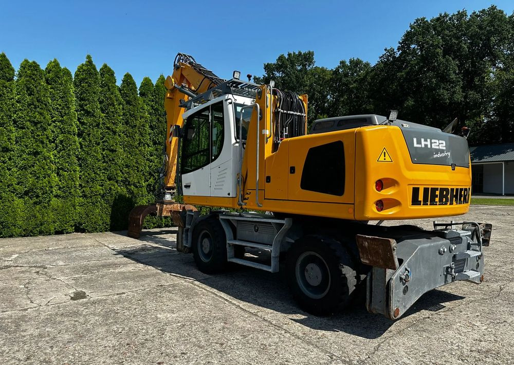 Liebherr LH22 M - Escavadeira de rodas: foto 2 Liebherr LH22 M - Escavadeira de rodas: foto 2