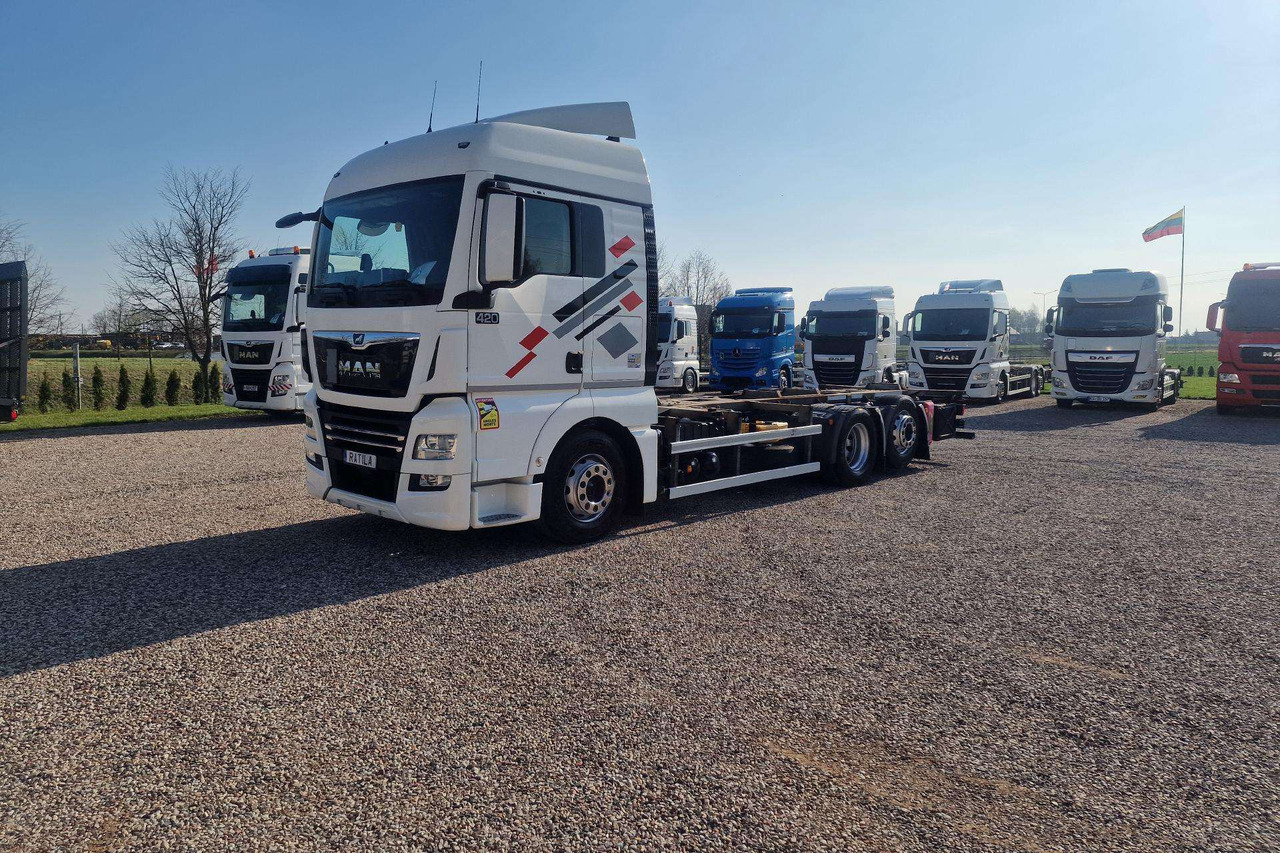 MAN TGX 26.430 - Camião transportador de contêineres/ Caixa móvel: foto 1 MAN TGX 26.430 - Camião transportador de contêineres/ Caixa móvel: foto 1
