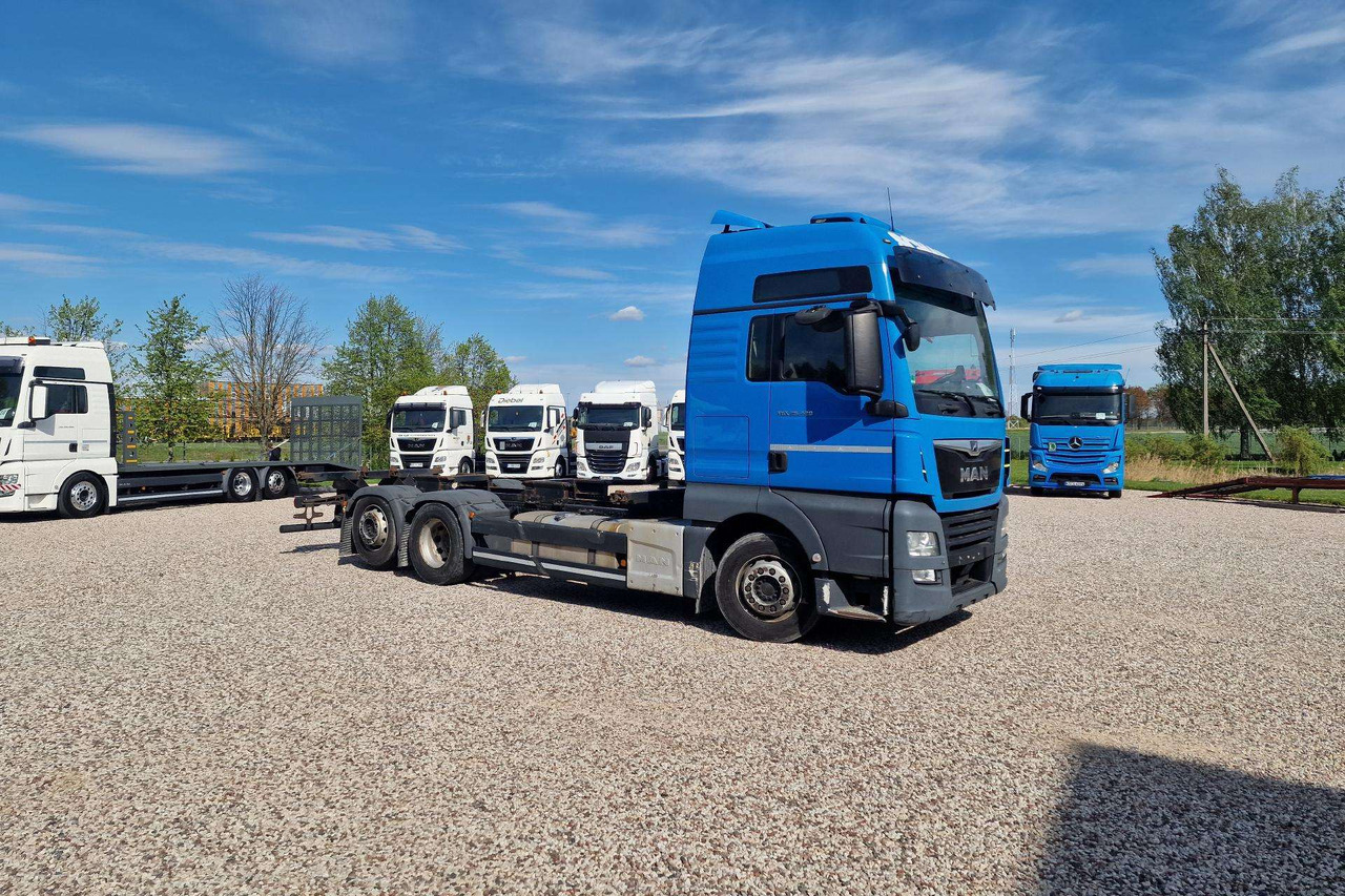 MAN TGX 26.460 - Camião transportador de contêineres/ Caixa móvel: foto 1 MAN TGX 26.460 - Camião transportador de contêineres/ Caixa móvel: foto 1