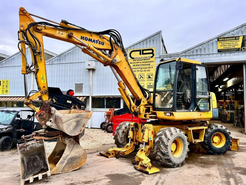 Komatsu PW110R-1 PELLE A PNEUS 12T - Escavadeira de rodas: foto 1 Komatsu PW110R-1 PELLE A PNEUS 12T - Escavadeira de rodas: foto 1