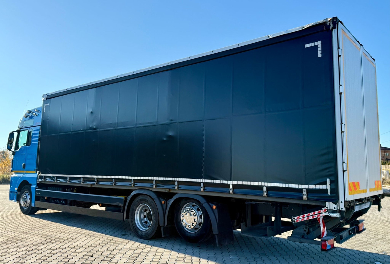 MAN TGX 26.420 / FIRANKA / WINDA / 23 EUROPALETY / 6x2 / AUTOMAT / EURO 6 / OŚ PODNOSZONA / DUŻA KABINA / 2019 ROK - Camião de lona: foto 4 MAN TGX 26.420 / FIRANKA / WINDA / 23 EUROPALETY / 6x2 / AUTOMAT / EURO 6 / OŚ PODNOSZONA / DUŻA KABINA / 2019 ROK - Camião de lona: foto 4