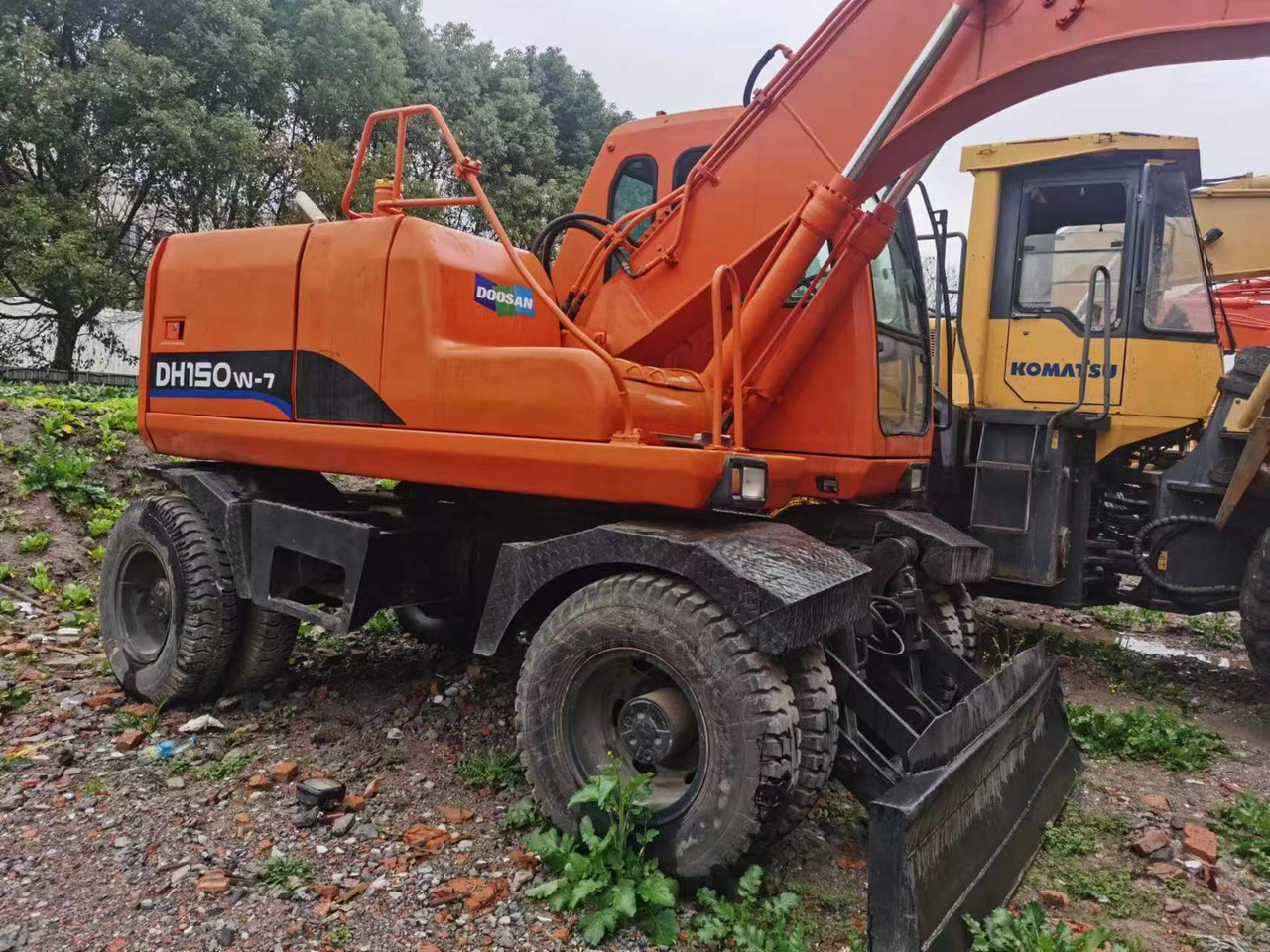 DOOSAN DH150W-7 - Escavadeira de rodas: foto 4 DOOSAN DH150W-7 - Escavadeira de rodas: foto 4
