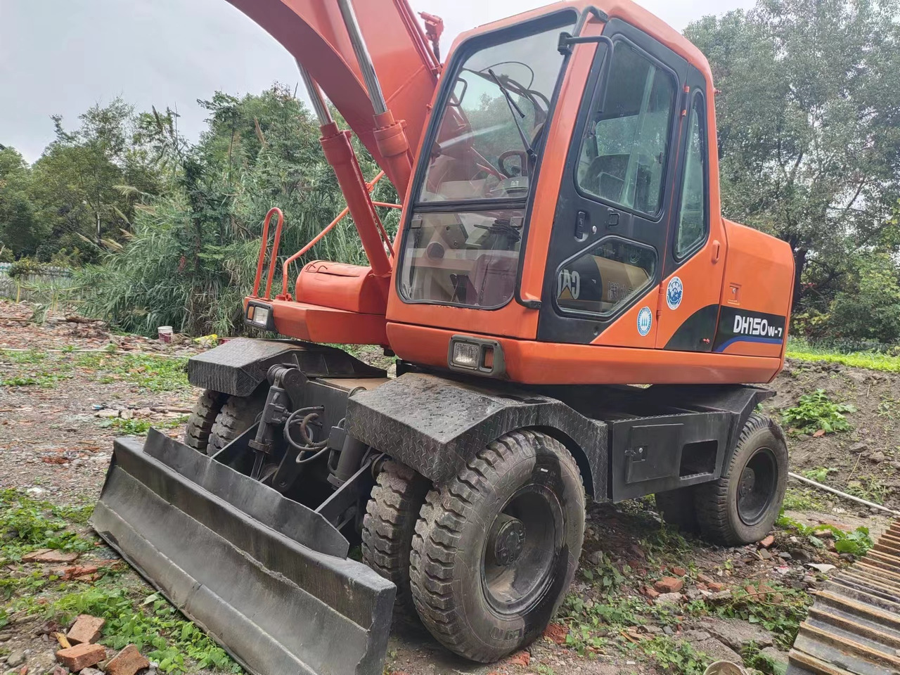 DOOSAN DH150W-7 - Escavadeira de rodas: foto 3 DOOSAN DH150W-7 - Escavadeira de rodas: foto 3