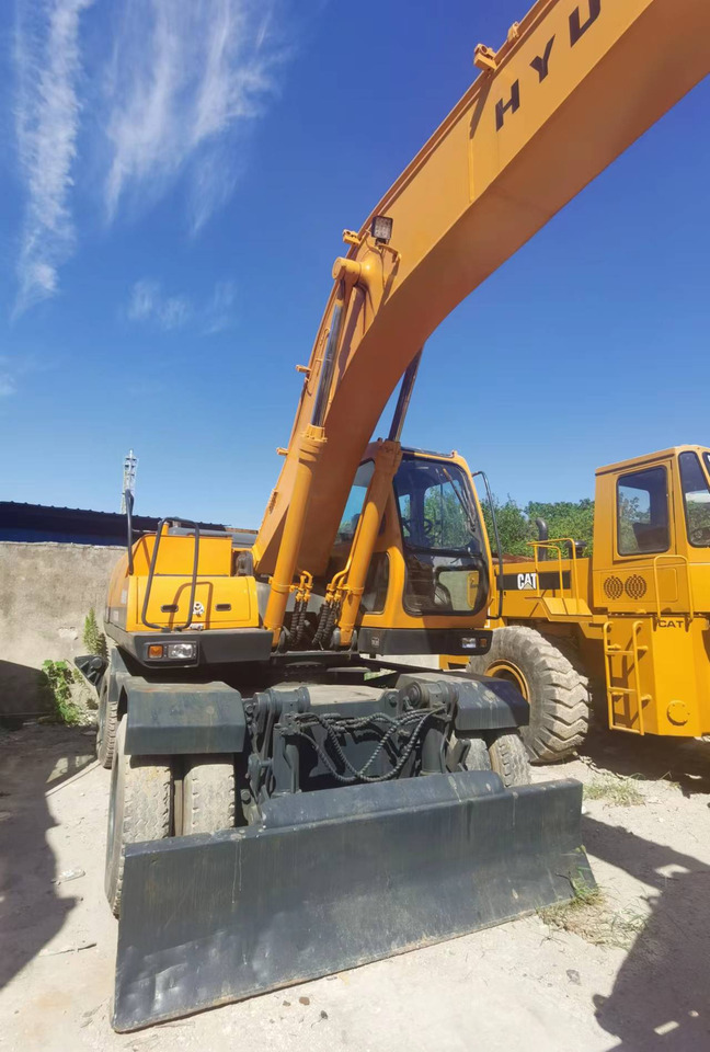 HYUNDAI ROBEX 210W-9 - Escavadeira de rodas: foto 5 HYUNDAI ROBEX 210W-9 - Escavadeira de rodas: foto 5