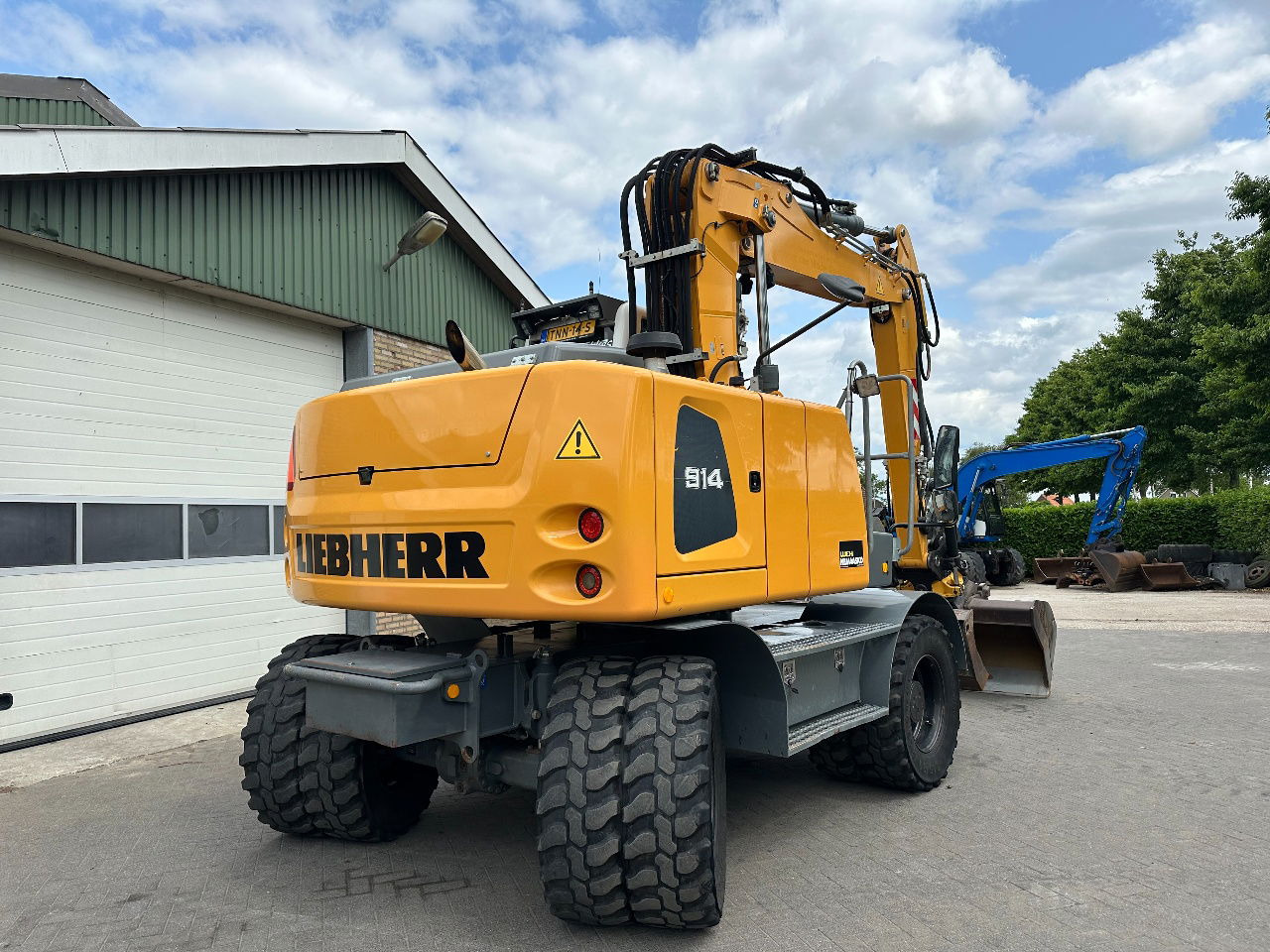 Liebherr A914 - Escavadeira de rodas: foto 3 Liebherr A914 - Escavadeira de rodas: foto 3