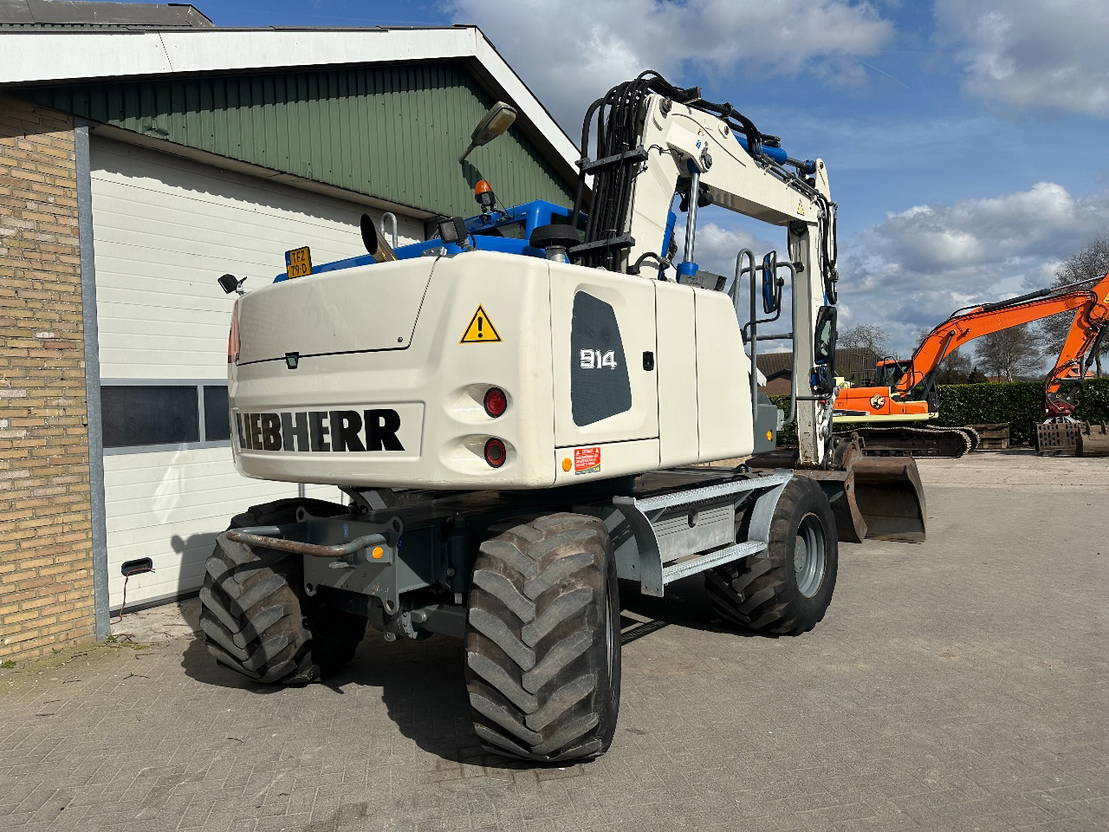 Liebherr A914 - Escavadeira de rodas: foto 4 Liebherr A914 - Escavadeira de rodas: foto 4