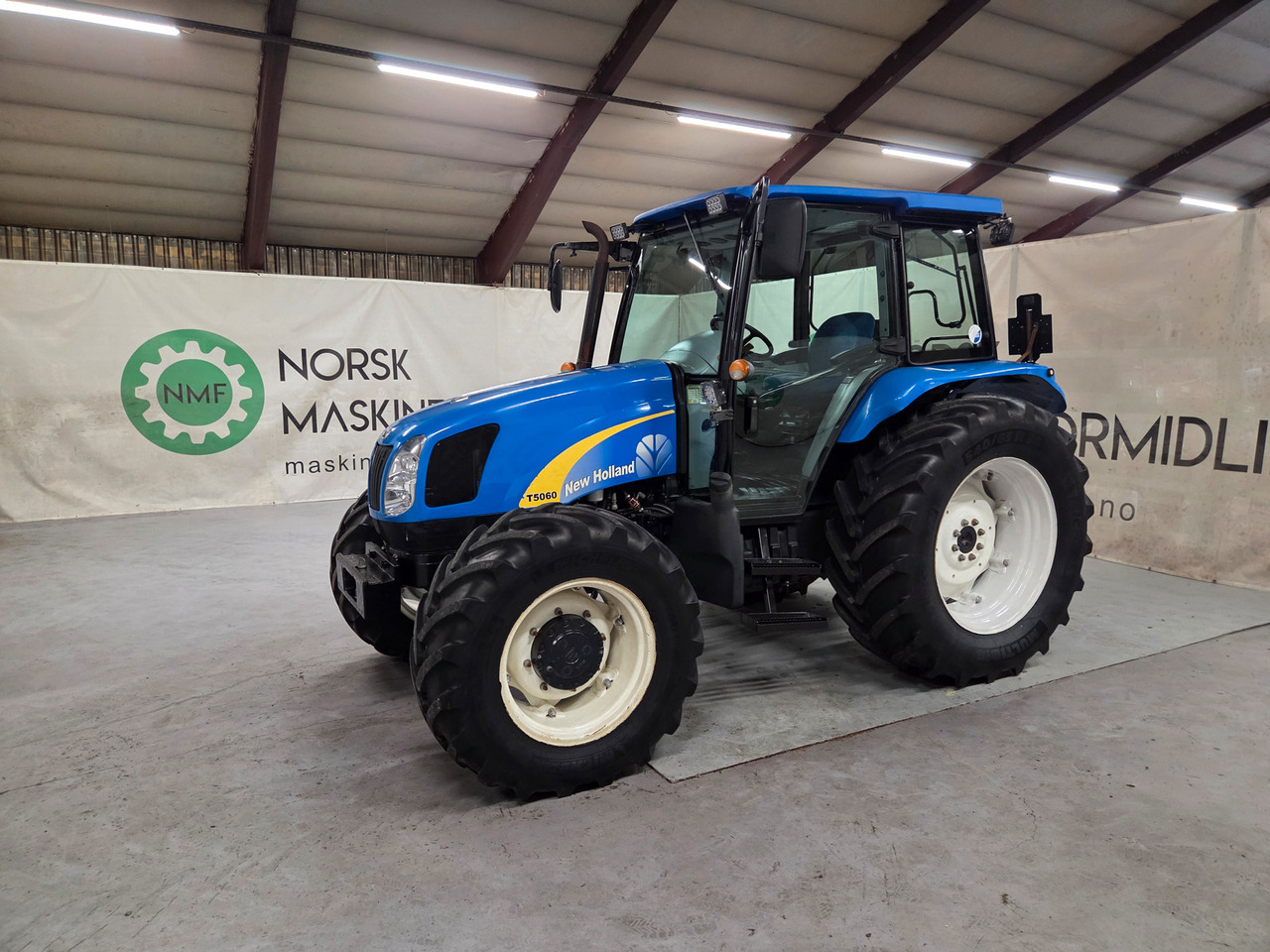 New Holland T5060 #Fin 1 eiers traktor - Trator: foto 1 New Holland T5060 #Fin 1 eiers traktor - Trator: foto 1