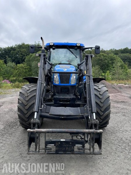 2012 New Holland T6050 med Trima +4.1P frontlaster og panser beskytter - 40 km/t - Trator: foto 2 2012 New Holland T6050 med Trima +4.1P frontlaster og panser beskytter - 40 km/t - Trator: foto 2