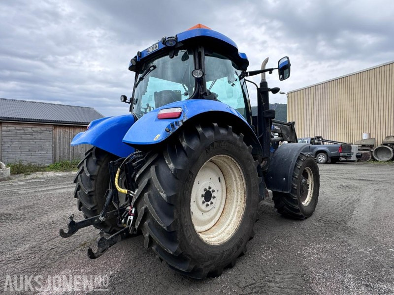 2012 New Holland T6050 med Trima +4.1P frontlaster og panser beskytter - 40 km/t - Trator: foto 4 2012 New Holland T6050 med Trima +4.1P frontlaster og panser beskytter - 40 km/t - Trator: foto 4